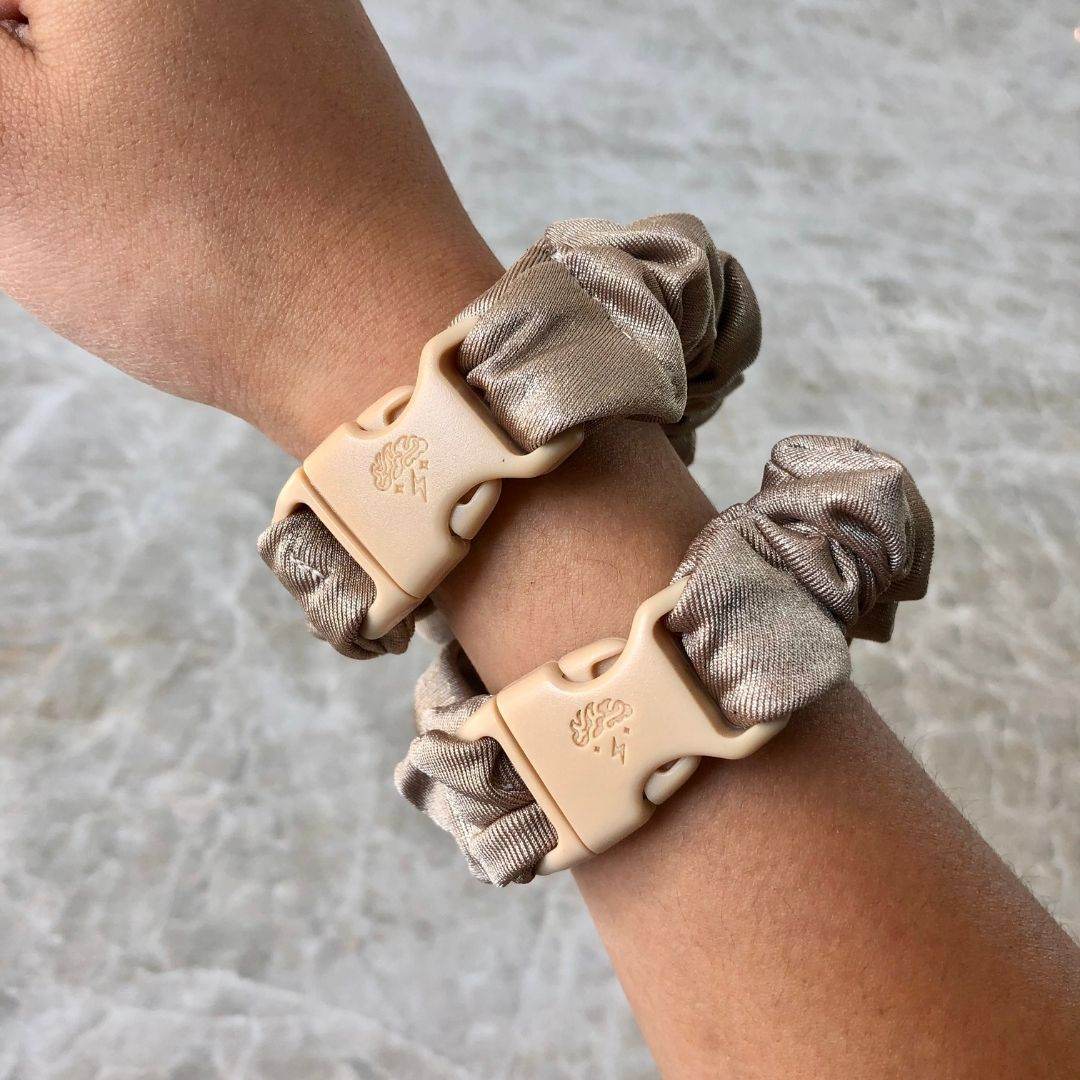 Best hair tie elastics and scrunchie hair accessories for snag-free, pull-free, rip-free, hair. Smooth, effortless hair ties and hair scrunchies for athletes, active moms, fitness, & sports. Blush Gold Buckle Scrunchie - No Snagging, No Tangles