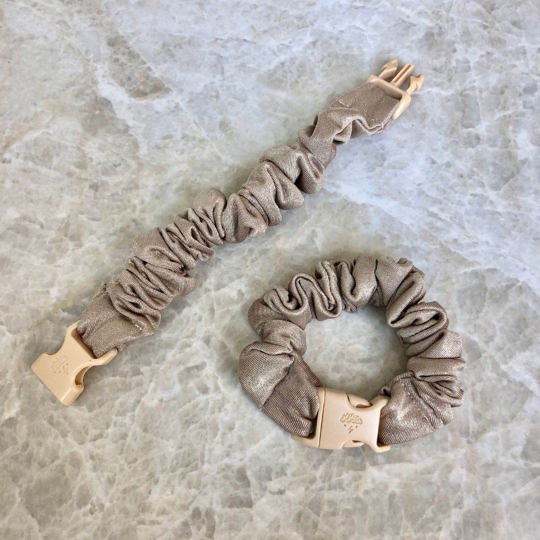 Best hair tie elastics and scrunchie hair accessories for snag-free, pull-free, rip-free, hair. Smooth, effortless hair ties and hair scrunchies for athletes, active moms, fitness, & sports. Blush Gold Buckle Scrunchie - No Snagging, No Tangles