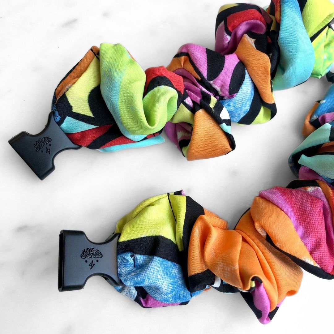Best hair tie elastics and scrunchie hair accessories for snag-free, pull-free, rip-free, hair. Smooth, effortless hair ties and hair scrunchies for athletes, active moms, fitness, & sports. Miami Neon Buckle Scrunchie - No Snagging, No Tangles