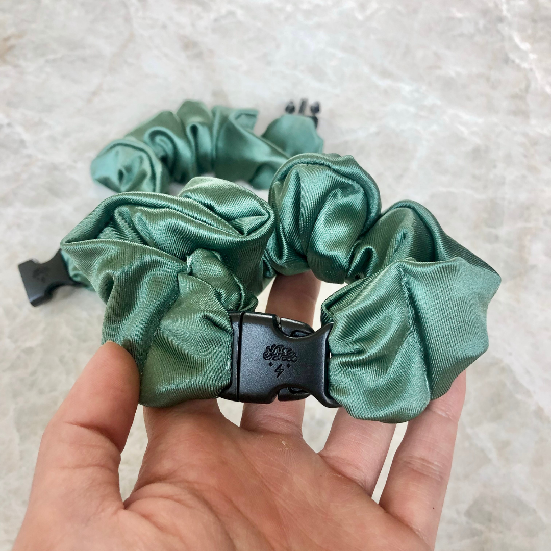 Best hair tie elastics and scrunchie hair accessories for snag-free, pull-free, rip-free, hair. Smooth, effortless hair ties and hair scrunchies for athletes, active moms, fitness, & sports. Buckle Scrunchie - Vibrant Solid Colors - No Snagging, No Tangles Sage Green Recycled Satin Standard (1.25 to 1.5 inch thickness)