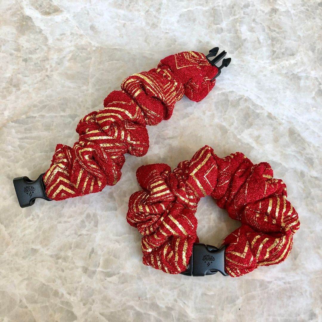 Best hair tie elastics and scrunchie hair accessories for snag-free, pull-free, rip-free, hair. Smooth, effortless hair ties and hair scrunchies for athletes, active moms, fitness, & sports. Merry & Bright Red Holiday Buckle Scrunchie - No Snagging, No Tangles Merry & Bright Red Recycled Polyblend Standard (1.25 to 1.5 inch thickness)