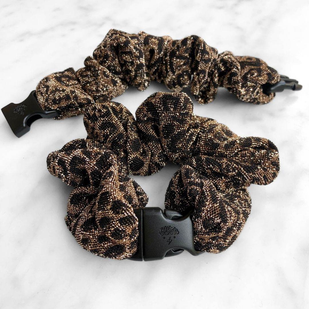 Best hair tie elastics and scrunchie hair accessories for snag-free, pull-free, rip-free, hair. Smooth, effortless hair ties and hair scrunchies for athletes, active moms, fitness, & sports. Spotted Spark - Sparkly Leopard Print Buckle Scrunchie - No Snagging, No Tangles Spotted Spark