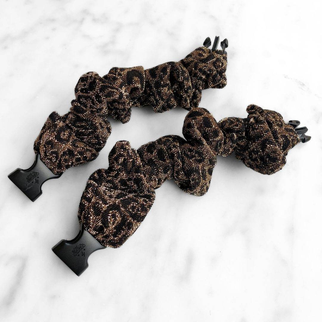 Best hair tie elastics and scrunchie hair accessories for snag-free, pull-free, rip-free, hair. Smooth, effortless hair ties and hair scrunchies for athletes, active moms, fitness, & sports. Spotted Spark - Sparkly Leopard Print Buckle Scrunchie - No Snagging, No Tangles