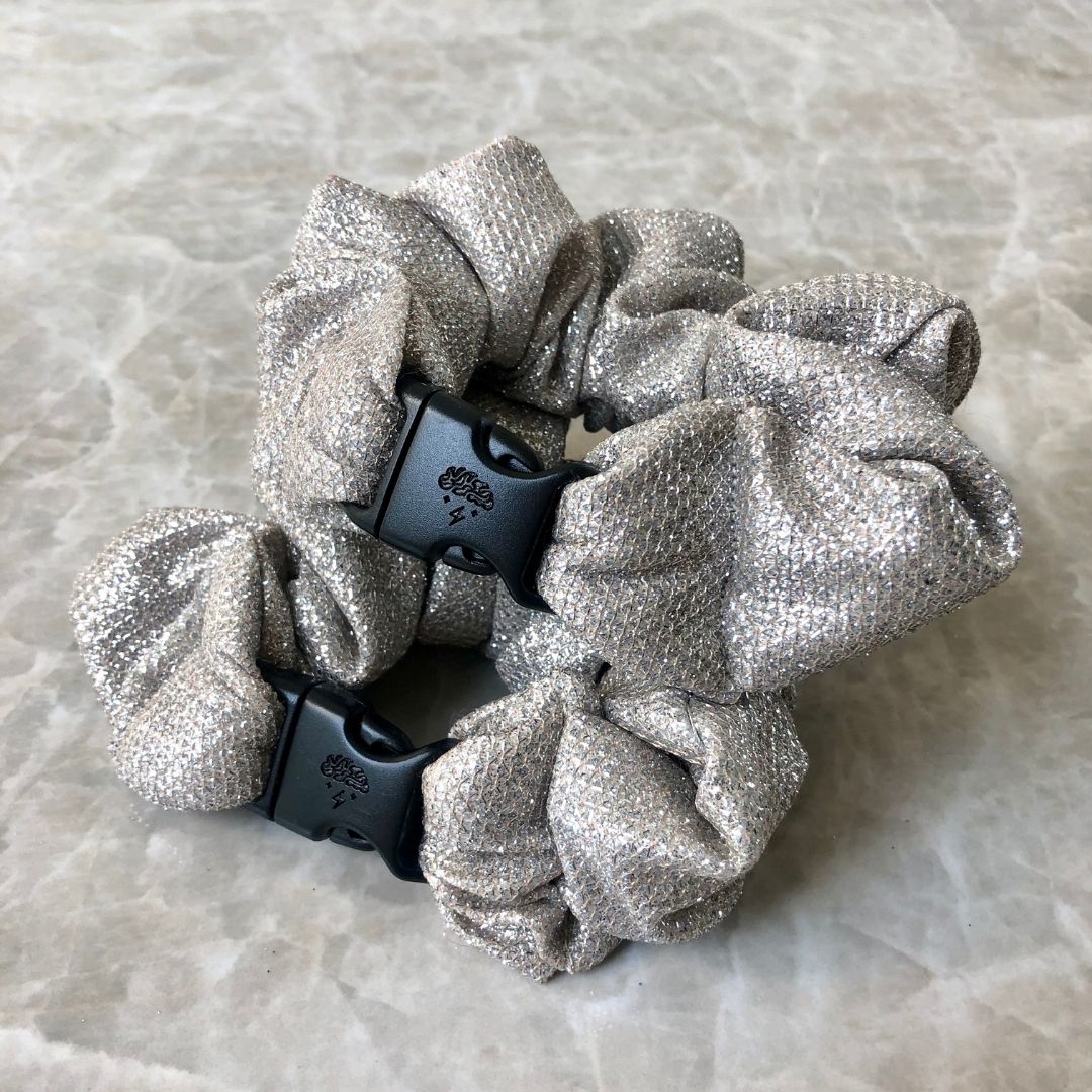 Best hair tie elastics and scrunchie hair accessories for snag-free, pull-free, rip-free, hair. Smooth, effortless hair ties and hair scrunchies for athletes, active moms, fitness, & sports. Sparkling Silver Buckle Scrunchie - No Snagging, No Tangles