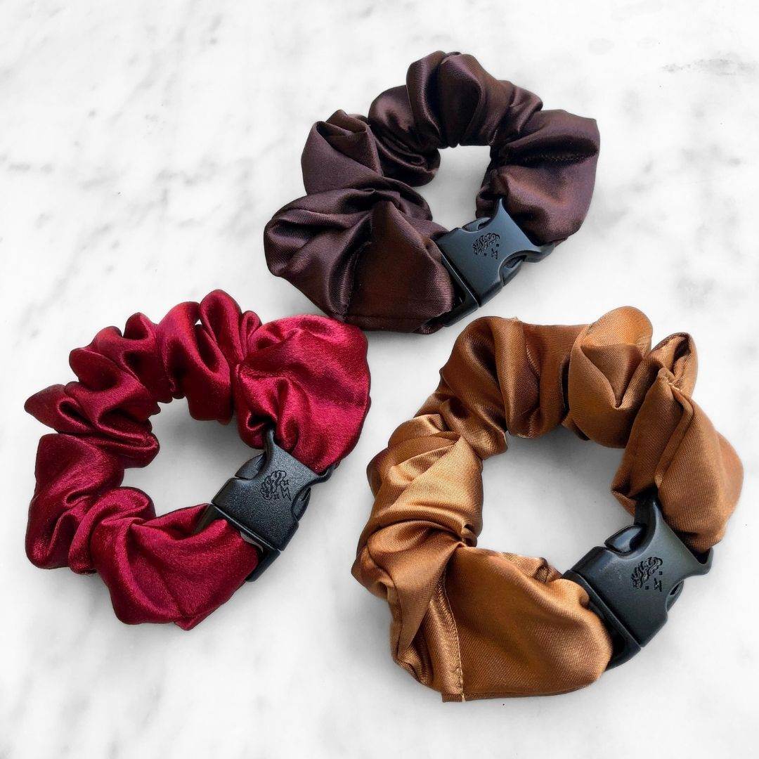 Best hair tie elastics and scrunchie hair accessories for snag-free, pull-free, rip-free, hair. Smooth, effortless hair ties and hair scrunchies for athletes, active moms, fitness, & sports. Fall Essentials - 3-Pack Autumn Halloween Buckle Scrunchies - No Snagging, No Tangles