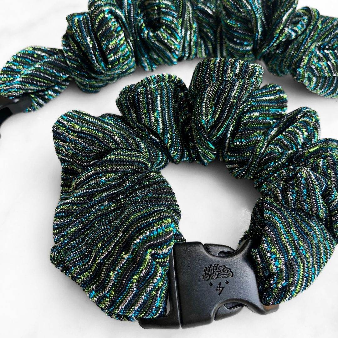 Best hair tie elastics and scrunchie hair accessories for snag-free, pull-free, rip-free, hair. Smooth, effortless hair ties and hair scrunchies for athletes, active moms, fitness, & sports. Peacock Stripes Buckle Scrunchie - No Snagging, No Tangles