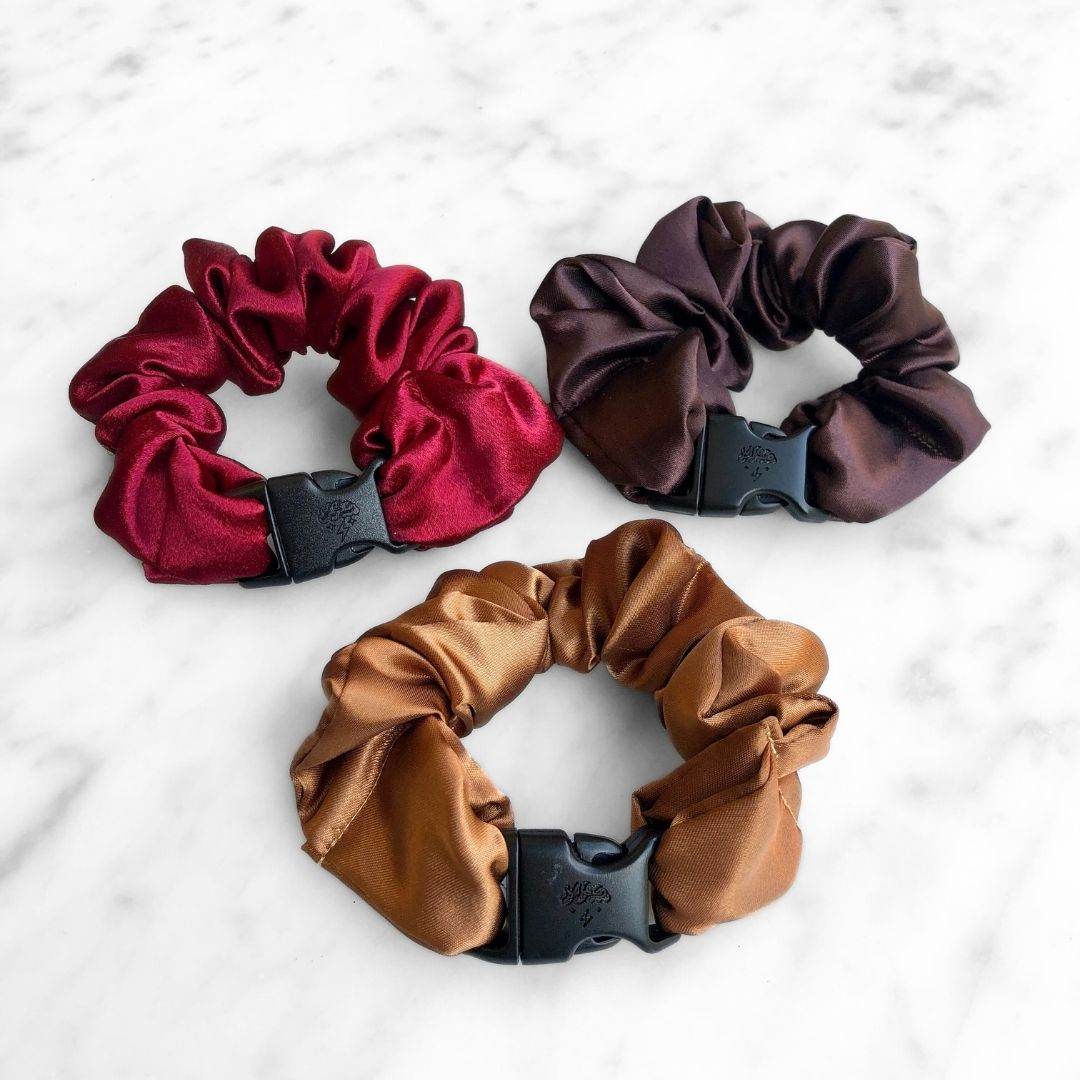 Best hair tie elastics and scrunchie hair accessories for snag-free, pull-free, rip-free, hair. Smooth, effortless hair ties and hair scrunchies for athletes, active moms, fitness, & sports. Fall Essentials - 3-Pack Autumn Halloween Buckle Scrunchies - No Snagging, No Tangles