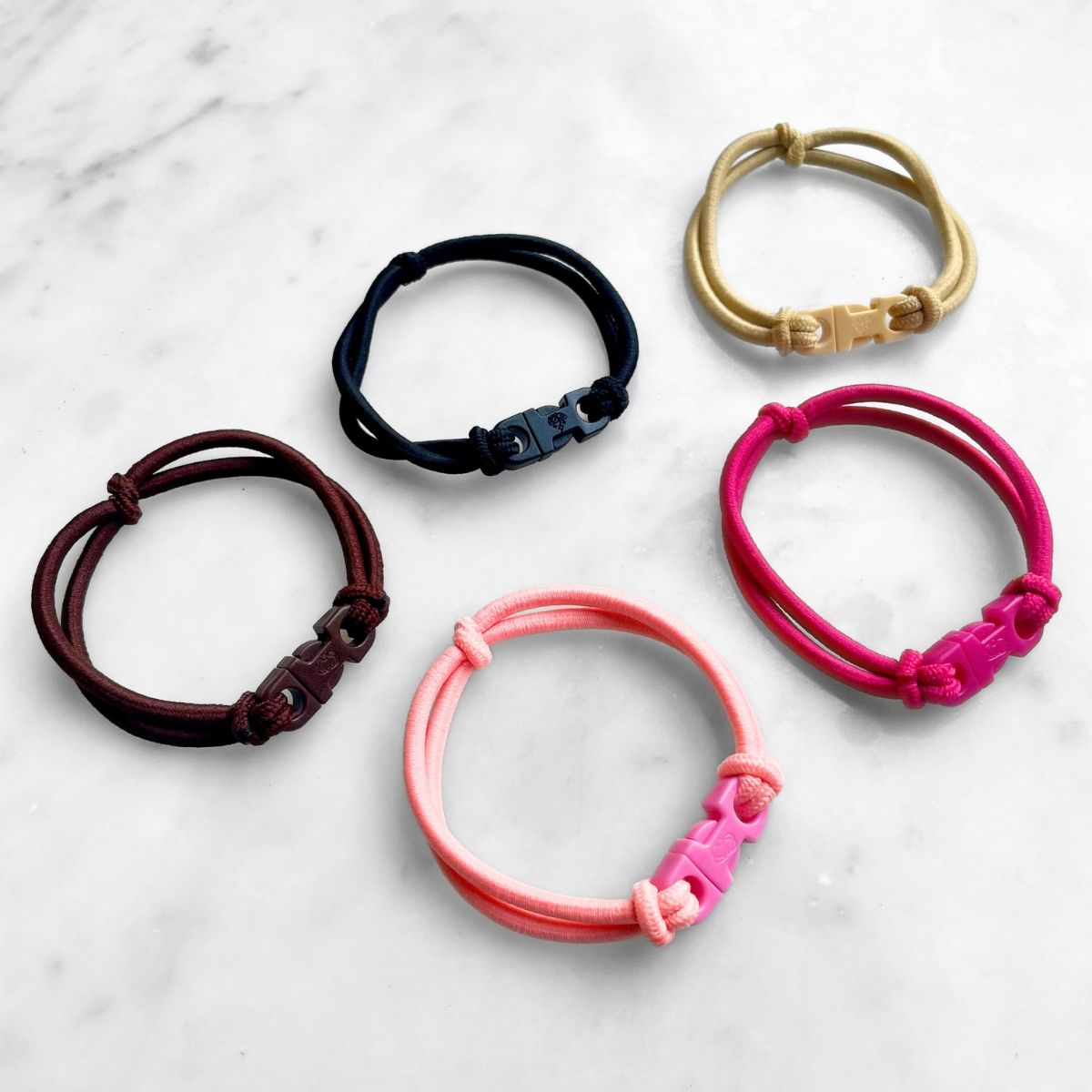 Buckle Hair Tie Variety 5 pack: one each in Industrial Black, Chocolate Brown, Champagne Blonde, Baby Pink, and Hot Pink