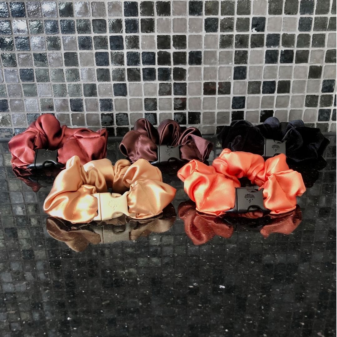 Best hair tie elastics and scrunchie hair accessories for snag-free, pull-free, rip-free, hair. Smooth, effortless hair ties and hair scrunchies for athletes, active moms, fitness, & sports. Fall Essentials - 5-Pack Autumn Halloween Buckle Scrunchies - No Snagging, No Tangles