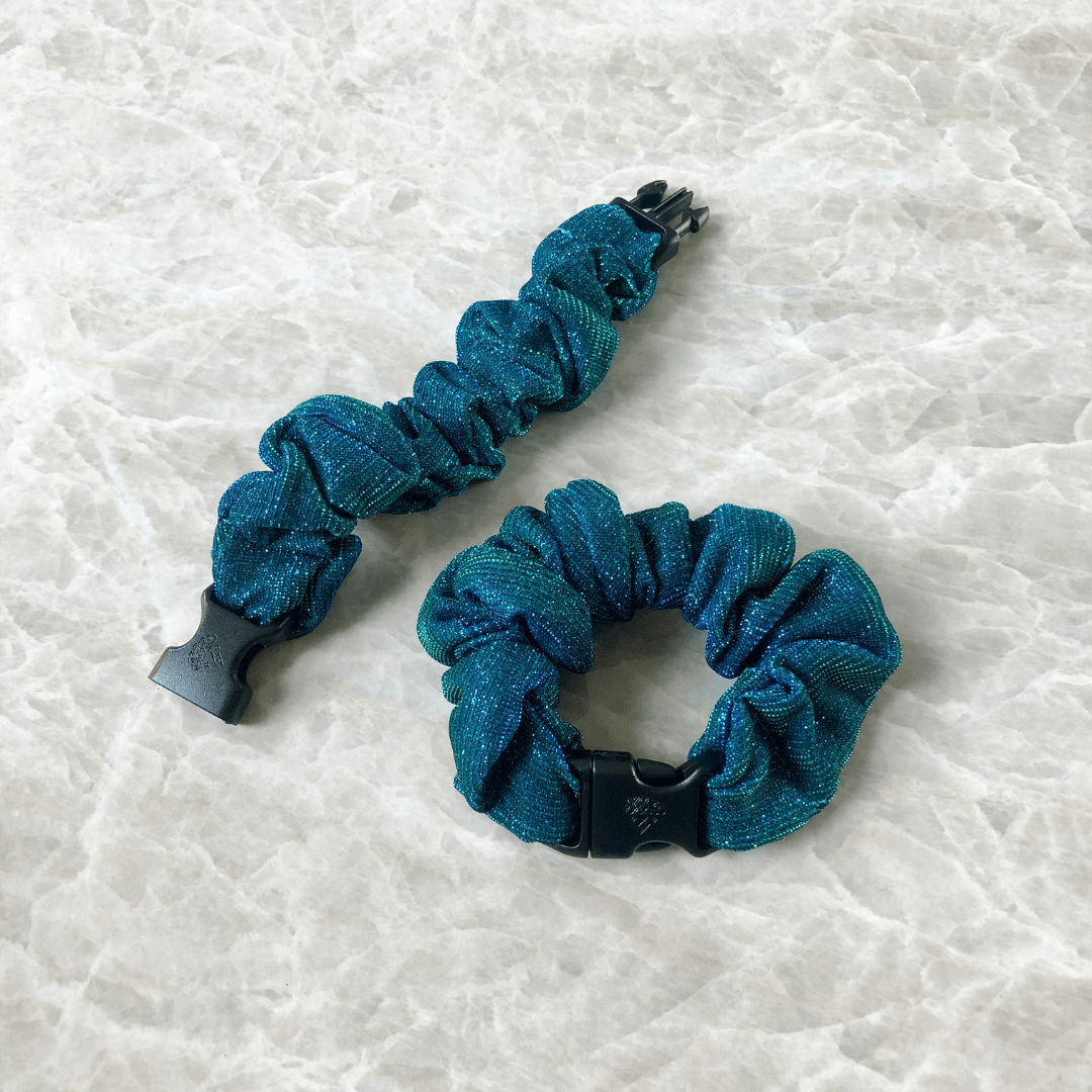 Best hair tie elastics and scrunchie hair accessories for snag-free, pull-free, rip-free, hair. Smooth, effortless hair ties and hair scrunchies for athletes, active moms, fitness, & sports. Mystic Mermaid Teal Buckle Scrunchie - No Snagging, No Tangles