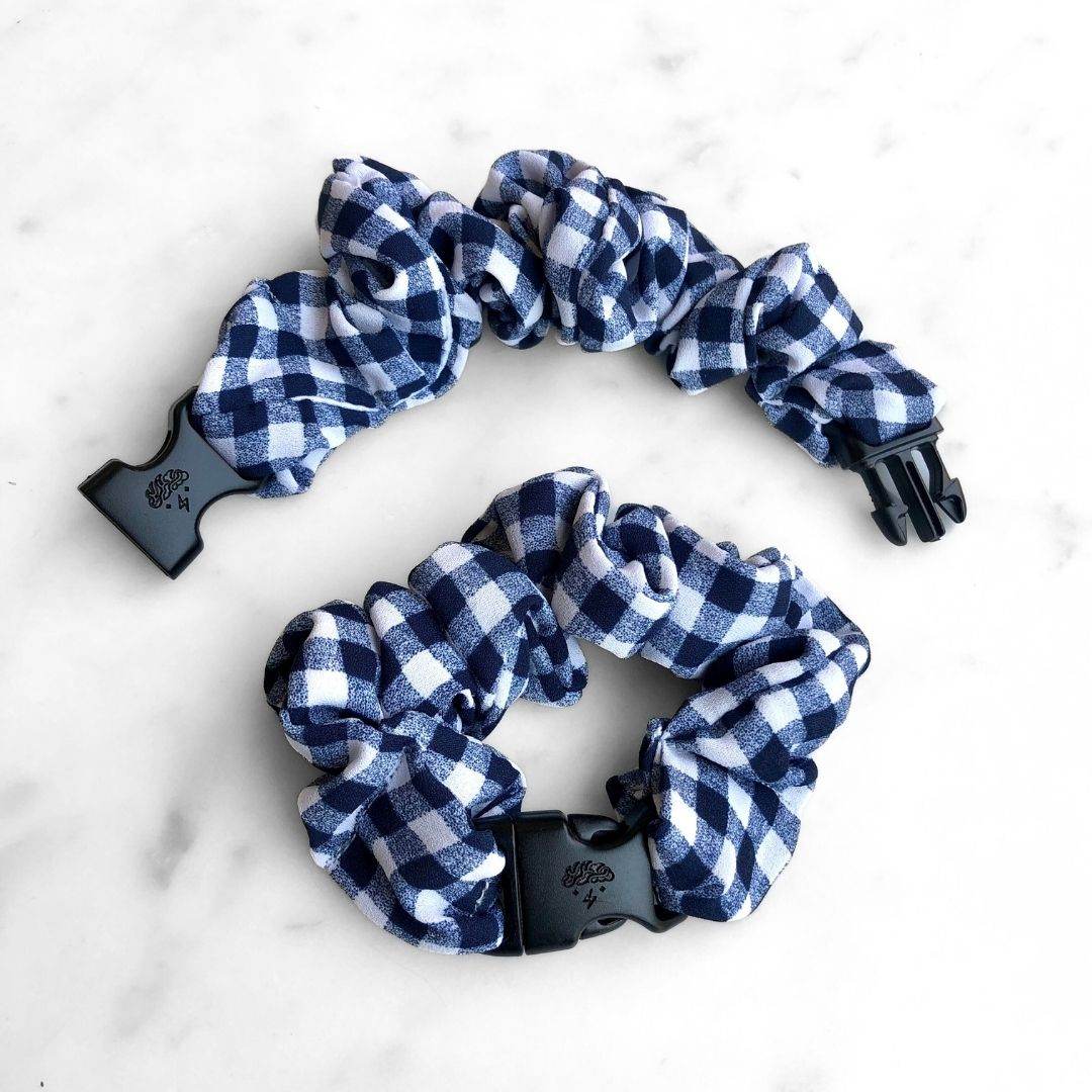 Best hair tie elastics and scrunchie hair accessories for snag-free, pull-free, rip-free, hair. Smooth, effortless hair ties and hair scrunchies for athletes, active moms, fitness, & sports. Gingham Navy Buckle Scrunchie - No Snagging, No Tangles Gingham Navy
