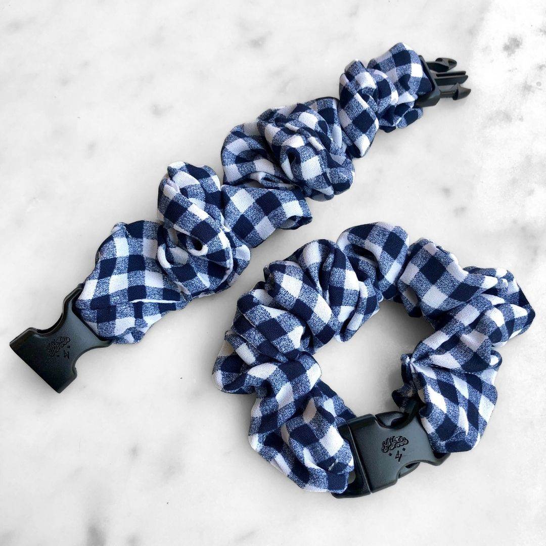 Best hair tie elastics and scrunchie hair accessories for snag-free, pull-free, rip-free, hair. Smooth, effortless hair ties and hair scrunchies for athletes, active moms, fitness, & sports. Gingham Navy Buckle Scrunchie - No Snagging, No Tangles