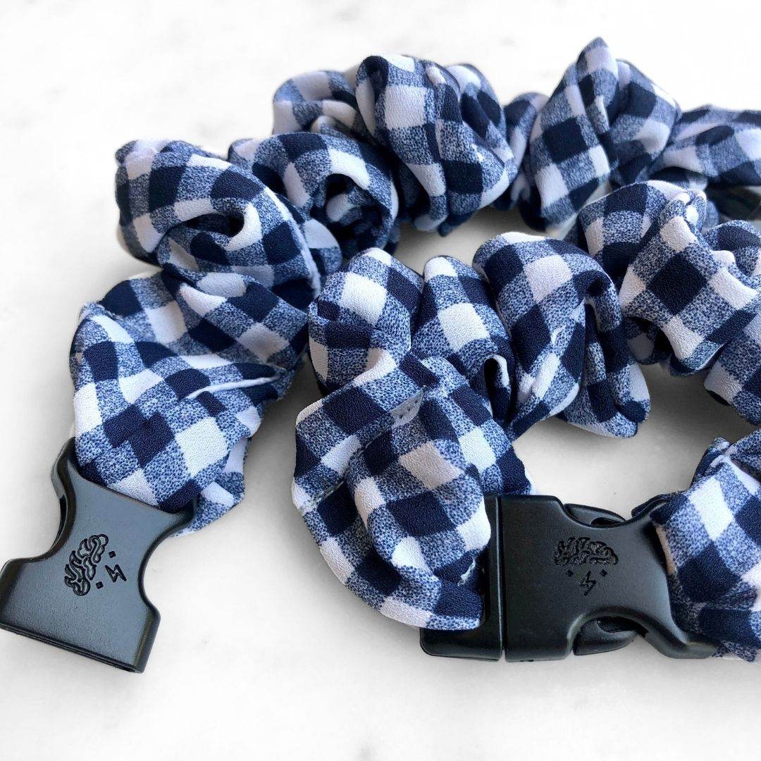 Best hair tie elastics and scrunchie hair accessories for snag-free, pull-free, rip-free, hair. Smooth, effortless hair ties and hair scrunchies for athletes, active moms, fitness, & sports. Gingham Navy Buckle Scrunchie - No Snagging, No Tangles