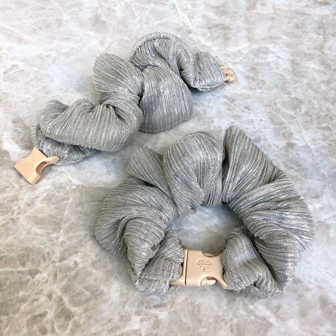 Best hair tie elastics and scrunchie hair accessories for snag-free, pull-free, rip-free, hair. Smooth, effortless hair ties and hair scrunchies for athletes, active moms, fitness, & sports. Tinsel Silver Buckle Scrunchie - No Snagging, No Tangles