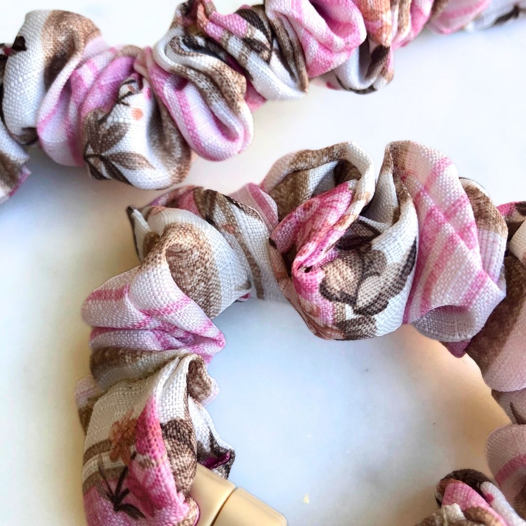 Best hair tie elastics and scrunchie hair accessories for snag-free, pull-free, rip-free, hair. Smooth, effortless hair ties and hair scrunchies for athletes, active moms, fitness, & sports. Pink Rose Stripes Buckle Scrunchie - No Snagging, No Tangles