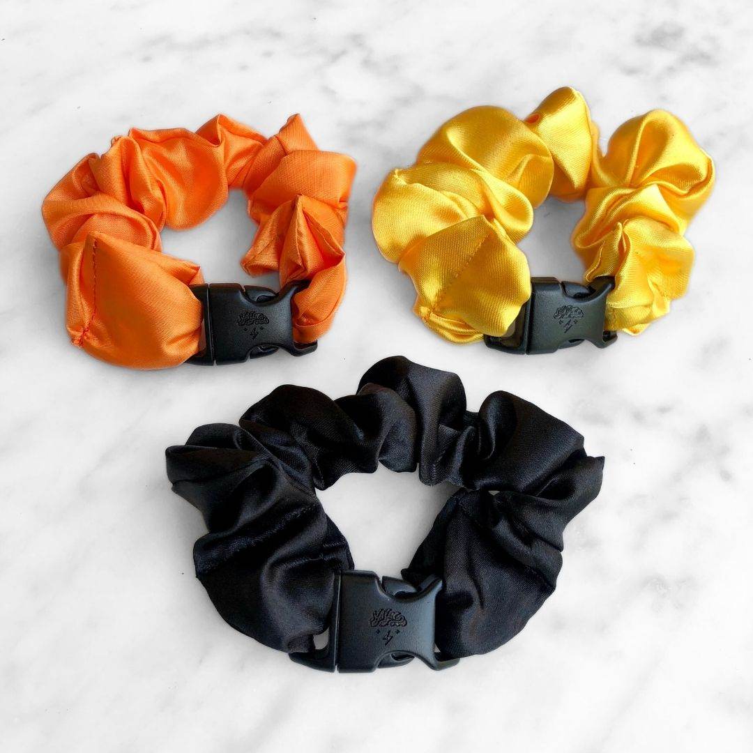 Best hair tie elastics and scrunchie hair accessories for snag-free, pull-free, rip-free, hair. Smooth, effortless hair ties and hair scrunchies for athletes, active moms, fitness, & sports. Trick or Treat Halloween Bundle - 3-Pack Fall Buckle Scrunchies - No Snagging, No Tangles