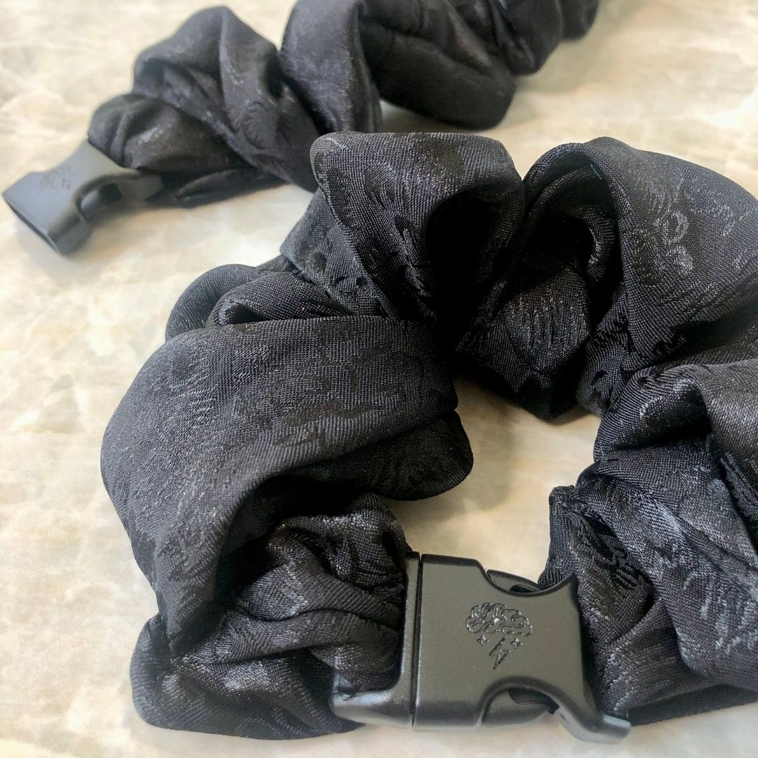 Best hair tie elastics and scrunchie hair accessories for snag-free, pull-free, rip-free, hair. Smooth, effortless hair ties and hair scrunchies for athletes, active moms, fitness, & sports. Ornate Floral Buckle Scrunchie - No Snagging, No Tangles Ornate Black Recycled Satin Standard (1.25 to 1.5 inch thickness)