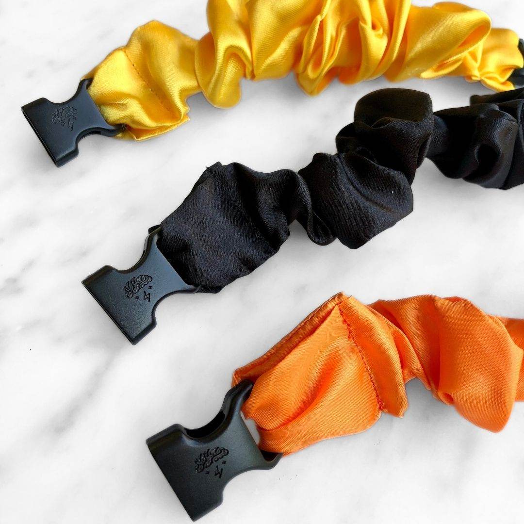 Best hair tie elastics and scrunchie hair accessories for snag-free, pull-free, rip-free, hair. Smooth, effortless hair ties and hair scrunchies for athletes, active moms, fitness, & sports. Trick or Treat Halloween Bundle - 3-Pack Fall Buckle Scrunchies - No Snagging, No Tangles