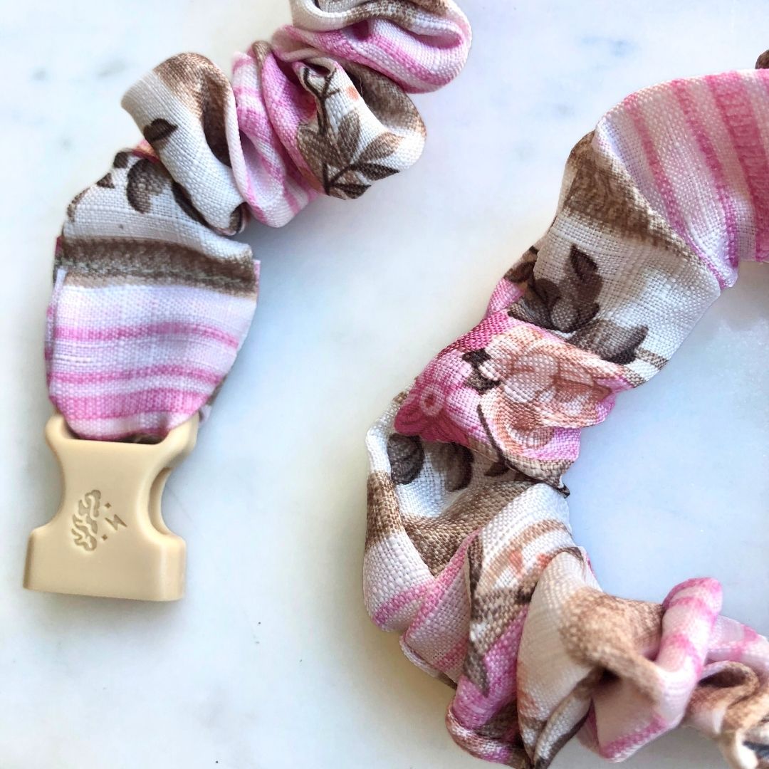 Best hair tie elastics and scrunchie hair accessories for snag-free, pull-free, rip-free, hair. Smooth, effortless hair ties and hair scrunchies for athletes, active moms, fitness, & sports. Pink Rose Stripes Buckle Scrunchie - No Snagging, No Tangles