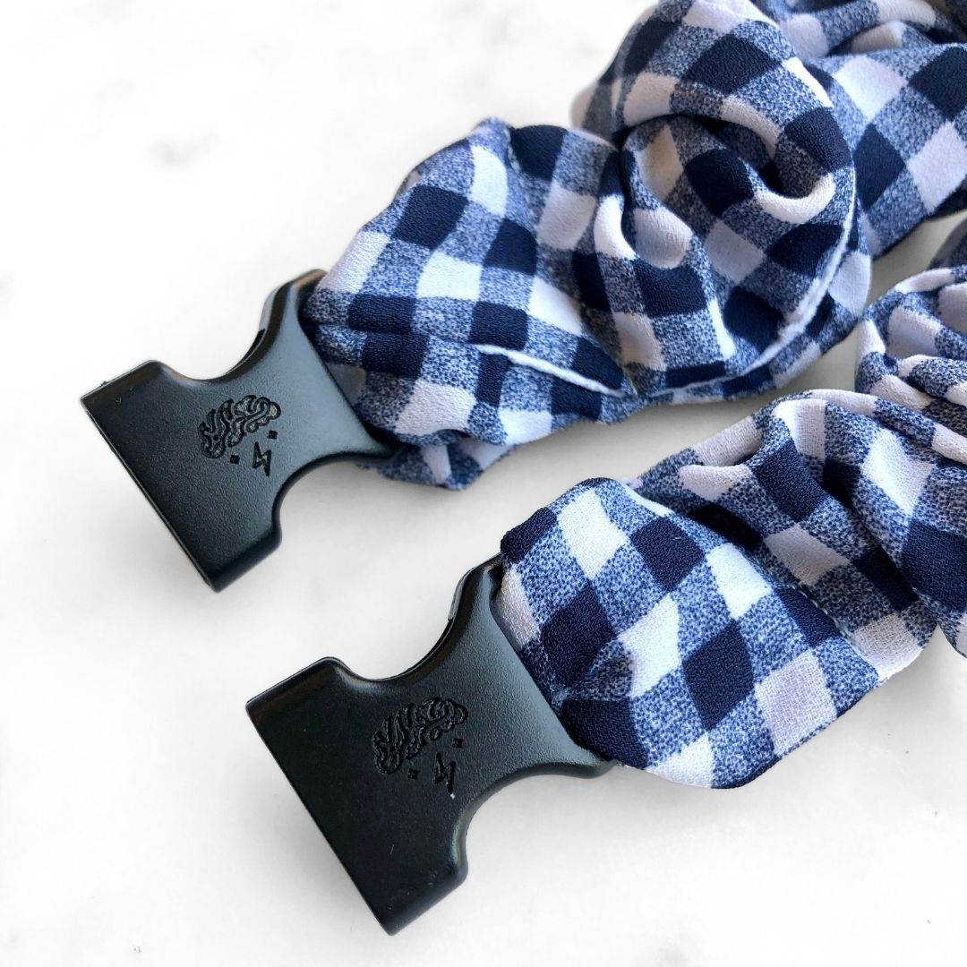 Best hair tie elastics and scrunchie hair accessories for snag-free, pull-free, rip-free, hair. Smooth, effortless hair ties and hair scrunchies for athletes, active moms, fitness, & sports. Gingham Navy Buckle Scrunchie - No Snagging, No Tangles