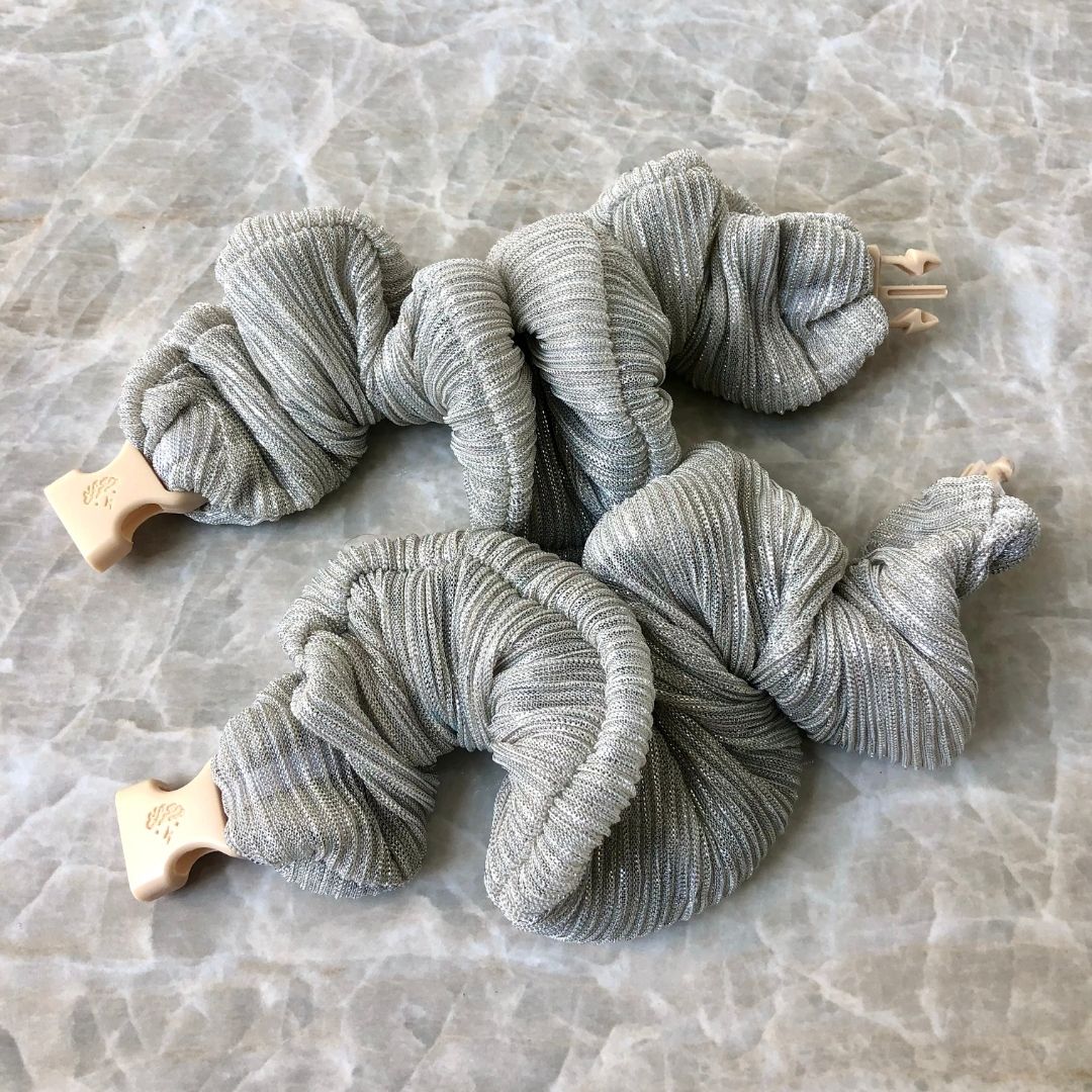 Best hair tie elastics and scrunchie hair accessories for snag-free, pull-free, rip-free, hair. Smooth, effortless hair ties and hair scrunchies for athletes, active moms, fitness, & sports. Tinsel Silver Buckle Scrunchie - No Snagging, No Tangles
