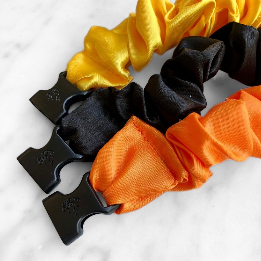 Best hair tie elastics and scrunchie hair accessories for snag-free, pull-free, rip-free, hair. Smooth, effortless hair ties and hair scrunchies for athletes, active moms, fitness, & sports. Trick or Treat Halloween Bundle - 3-Pack Fall Buckle Scrunchies - No Snagging, No Tangles