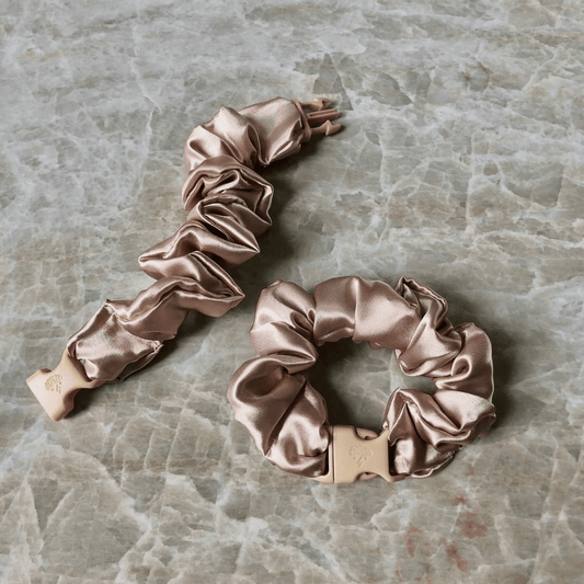 Best hair tie elastics and scrunchie hair accessories for snag-free, pull-free, rip-free, hair. Smooth, effortless hair ties and hair scrunchies for athletes, active moms, fitness, & sports. Buckle Scrunchie - Neutral Colors - No Snagging, No Tangles Champagne Blonde Recycled Satin Standard (1.25 to 1.5 inch thickness)