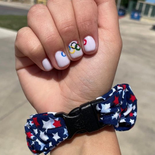 Best hair tie elastics and scrunchie hair accessories for snag-free, pull-free, rip-free, hair. Smooth, effortless hair ties and hair scrunchies for athletes, active moms, fitness, & sports. Team USA "Shooting" Stars Patriotic Buckle Scrunchie - No Snagging, No Tangles