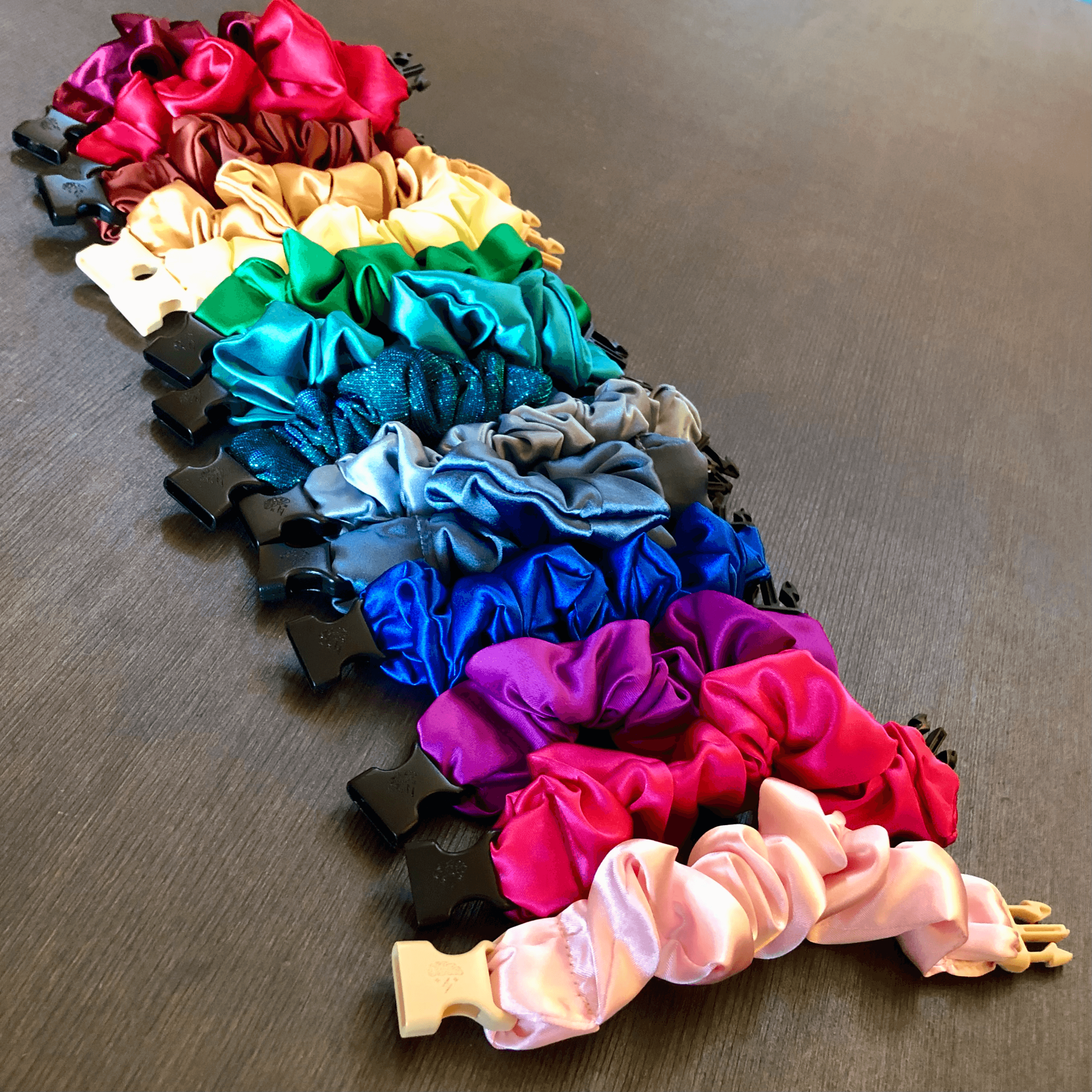 Best hair tie elastics and scrunchie hair accessories for snag-free, pull-free, rip-free, hair. Smooth, effortless hair ties and hair scrunchies for athletes, active moms, fitness, &amp; sports. Vibrant Colors - Buckle Scrunchies