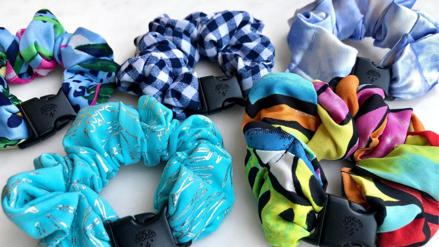 Best hair tie elastics and scrunchie hair accessories for snag-free, pull-free, rip-free, hair. Smooth, effortless hair ties and hair scrunchies for athletes, active moms, fitness, &amp; sports. Cute Hair Accessories - Buckle Scrunchies