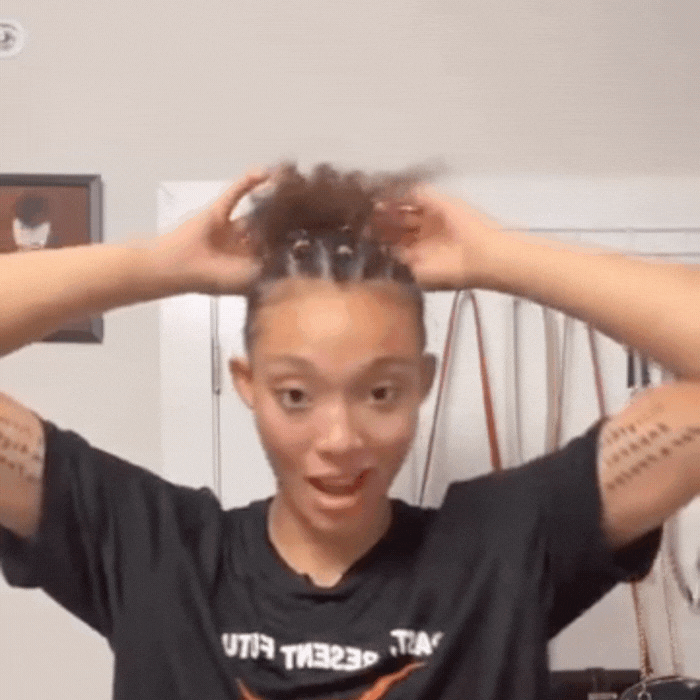 Wedding Hair Accessories: Young woman with a curly updo held by a Buckle Scrunchie