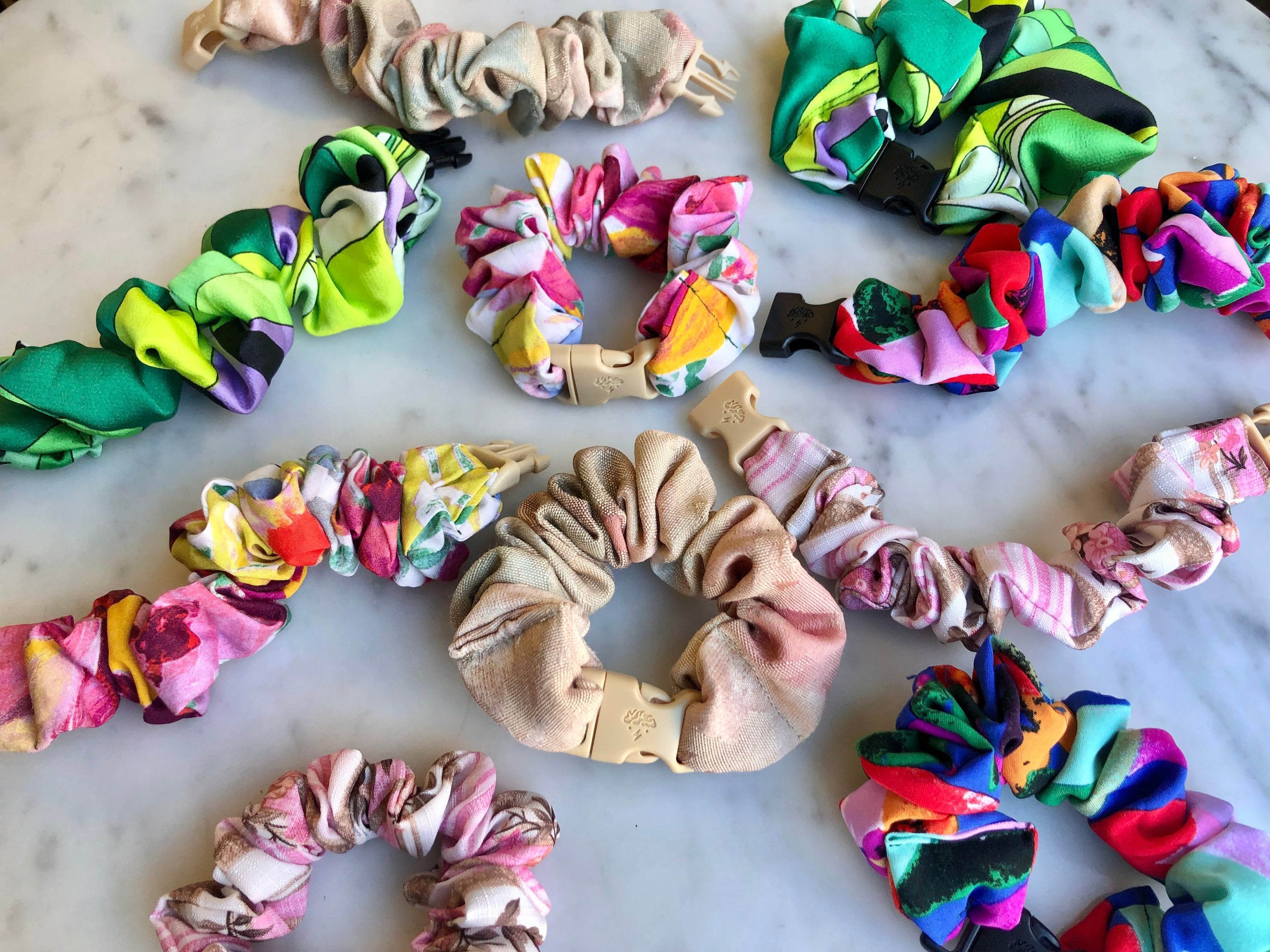 Best hair tie elastics and scrunchie hair accessories for snag-free, pull-free, rip-free, hair. Smooth, effortless hair ties and hair scrunchies for athletes, active moms, fitness, &amp; sports. Spring Buckle Scrunchies - Buckle Scrunchies