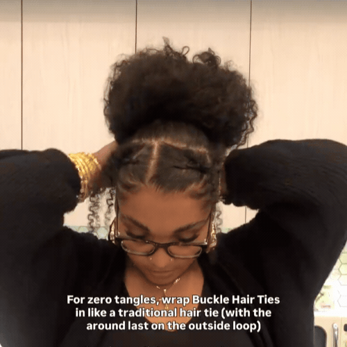 Best Hair Ties for Textured Hair: Athlete with curly hair wrapping a Buckle Hair Tie for zero tangles