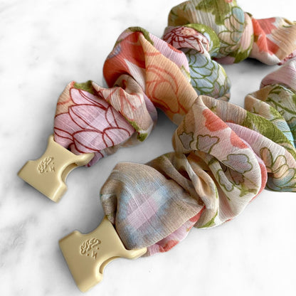 Best zero tangle no pull hair tie elastics and scrunchie hair accessories for snag-free, pull-free, rip-free, hair. Smooth, effortless hair ties and hair scrunchies for athletes, active moms, fitness, & sports. Wildflower Field Floral Chiffon Buckle Scrunchie - No Snagging, No Tangles