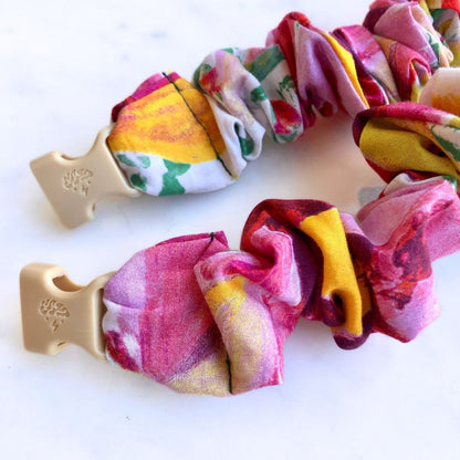 Best zero tangle no pull hair tie elastics and scrunchie hair accessories for snag-free, pull-free, rip-free, hair. Smooth, effortless hair ties and hair scrunchies for athletes, active moms, fitness, & sports. Watercolor Spring Buckle Scrunchie - No Snagging, No Tangles Watercolor Spring