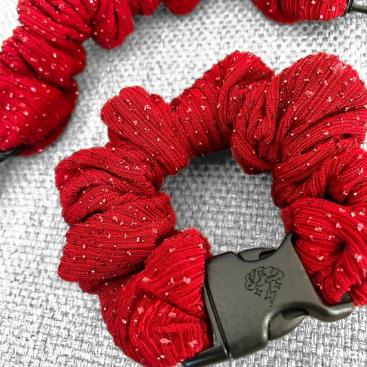 Best hair tie elastics and scrunchie hair accessories for snag-free, pull-free, rip-free, hair. Smooth, effortless hair ties and hair scrunchies for athletes, active moms, fitness, & sports. Tango Red Sparkles Buckle Scrunchie - No Snagging, No Tangles Tango Red Recycled Polyblend Standard (1.25 to 1.5 inch thickness)
