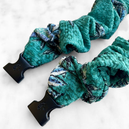 Best zero tangle no pull hair tie elastics and scrunchie hair accessories for snag-free, pull-free, rip-free, hair. Smooth, effortless hair ties and hair scrunchies for athletes, active moms, fitness, & sports. Tropic Teal Floral Buckle Scrunchie - No Snagging, No Tangles