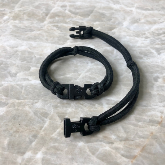 Best hair tie elastics and scrunchie hair accessories for snag-free, pull-free, rip-free, hair. Smooth, effortless hair ties and hair scrunchies for athletes, active moms, fitness, & sports. Buckle Hair Tie Elastics - No Snagging, No Tangles Industrial Black Extra Stretchy Elastic