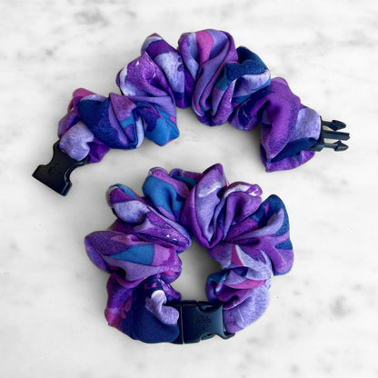 Best zero tangle no pull hair tie elastics and scrunchie hair accessories for snag-free, pull-free, rip-free, hair. Smooth, effortless hair ties and hair scrunchies for athletes, active moms, fitness, & sports. Twilight Garden Purple Floral Buckle Scrunchie - No Snagging, No Tangles