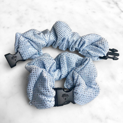 Best zero tangle no pull hair tie elastics and scrunchie hair accessories for snag-free, pull-free, rip-free, hair. Smooth, effortless hair ties and hair scrunchies for athletes, active moms, fitness, & sports. Frozen Blue Sparkles Buckle Scrunchie - No Snagging, No Tangles Frozen Blue Sparkles Recycled Polyblend Standard (1.25 to 1.5 inch thickness)