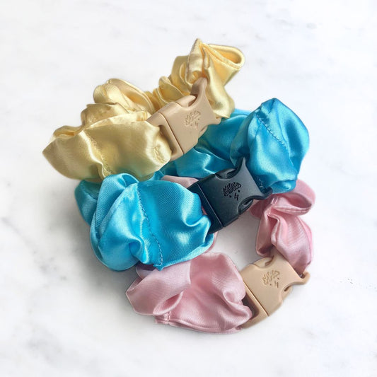 Best hair tie elastics and scrunchie hair accessories for snag-free, pull-free, rip-free, hair. Smooth, effortless hair ties and hair scrunchies for athletes, active moms, fitness, & sports. Cotton Candy - 3-Pack Vibrant Pastel Buckle Scrunchies Bundle - No Snagging, No Tangles Recycled Satin Standard (1.25 to 1.5 inch thickness)