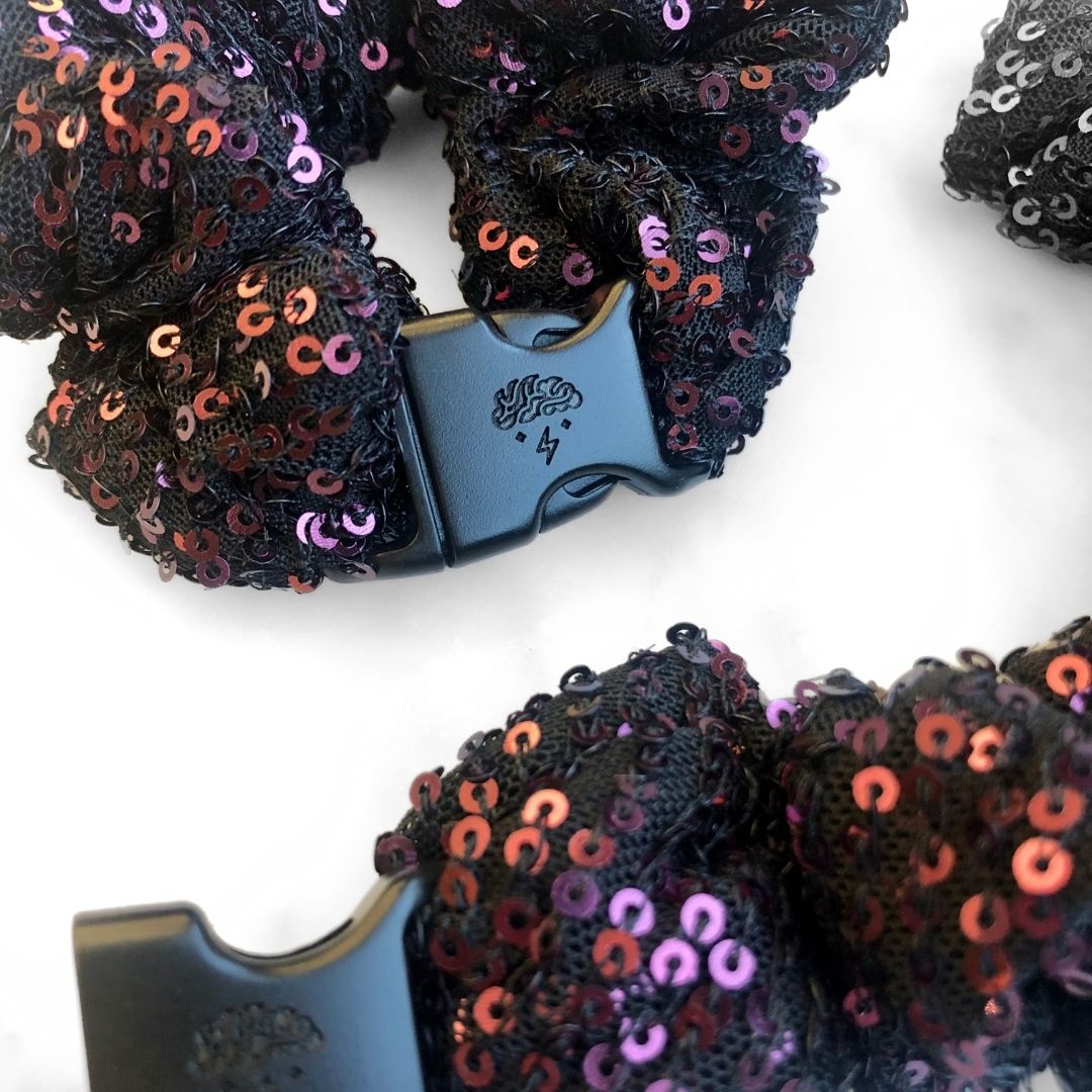 Best hair tie elastics and scrunchie hair accessories for snag-free, pull-free, rip-free, hair. Smooth, effortless hair ties and hair scrunchies for athletes, active moms, fitness, & sports. Punk Fuchsia Sequin Buckle Scrunchie - No Snagging, No Tangles