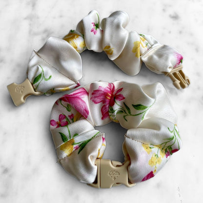 Best zero tangle no pull hair tie elastics and scrunchie hair accessories for snag-free, pull-free, rip-free, hair. Smooth, effortless hair ties and hair scrunchies for athletes, active moms, fitness, & sports. Lily Ivory Floral Buckle Scrunchie - No Snagging, No Tangles Lily Ivory Recycled Satin