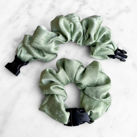 Best zero tangle no pull hair tie elastics and scrunchie hair accessories for snag-free, pull-free, rip-free, hair. Smooth, effortless hair ties and hair scrunchies for athletes, active moms, fitness, & sports. Petal Sage Floral Buckle Scrunchie - No Snagging, No Tangles Petal Sage Recycled Jacquard Satin