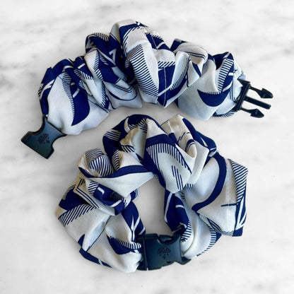 Best zero tangle no pull hair tie elastics and scrunchie hair accessories for snag-free, pull-free, rip-free, hair. Smooth, effortless hair ties and hair scrunchies for athletes, active moms, fitness, & sports. Palm Beach Navy Buckle Scrunchie - No Snagging, No Tangles Palm Beach Navy