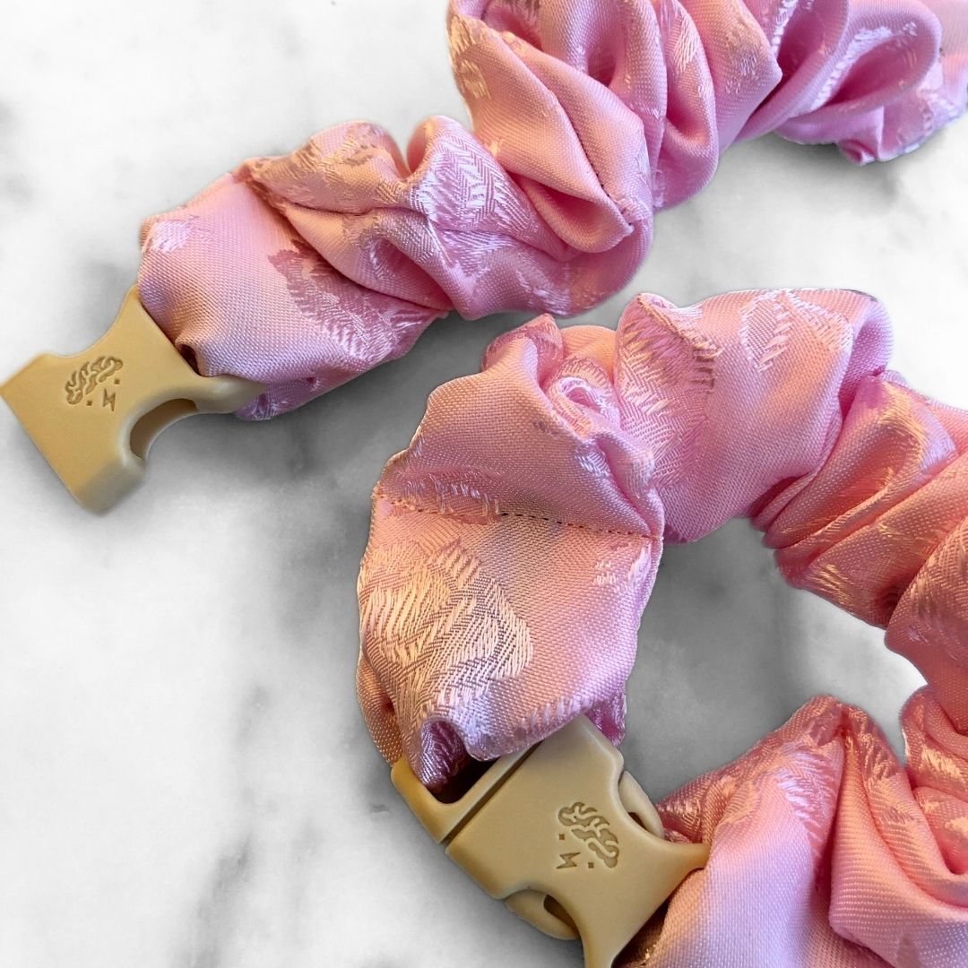 Best zero tangle no pull hair tie elastics and scrunchie hair accessories for snag-free, pull-free, rip-free, hair. Smooth, effortless hair ties and hair scrunchies for athletes, active moms, fitness, & sports. Empress Pink Buckle Scrunchie - Lunar New Year Áo Dài - No Snagging, No Tangles
