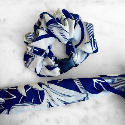 Best zero tangle no pull hair tie elastics and scrunchie hair accessories for snag-free, pull-free, rip-free, hair. Smooth, effortless hair ties and hair scrunchies for athletes, active moms, fitness, & sports. Palm Beach Navy Buckle Scrunchie - No Snagging, No Tangles