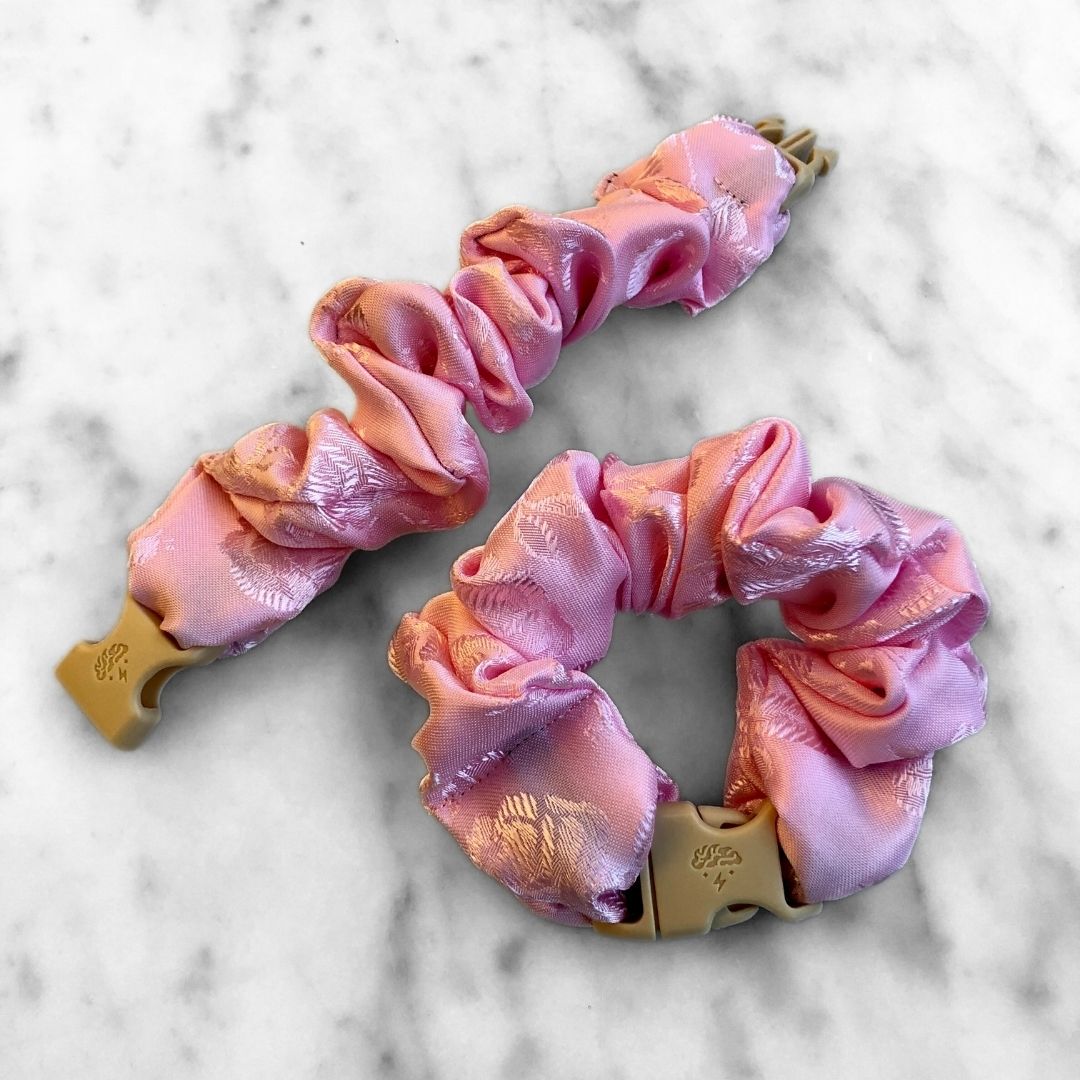 Best zero tangle no pull hair tie elastics and scrunchie hair accessories for snag-free, pull-free, rip-free, hair. Smooth, effortless hair ties and hair scrunchies for athletes, active moms, fitness, & sports. Empress Pink Buckle Scrunchie - Lunar New Year Áo Dài - No Snagging, No Tangles