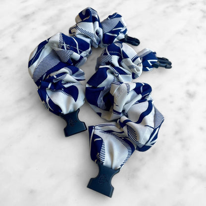 Best zero tangle no pull hair tie elastics and scrunchie hair accessories for snag-free, pull-free, rip-free, hair. Smooth, effortless hair ties and hair scrunchies for athletes, active moms, fitness, & sports. Palm Beach Navy Buckle Scrunchie - No Snagging, No Tangles