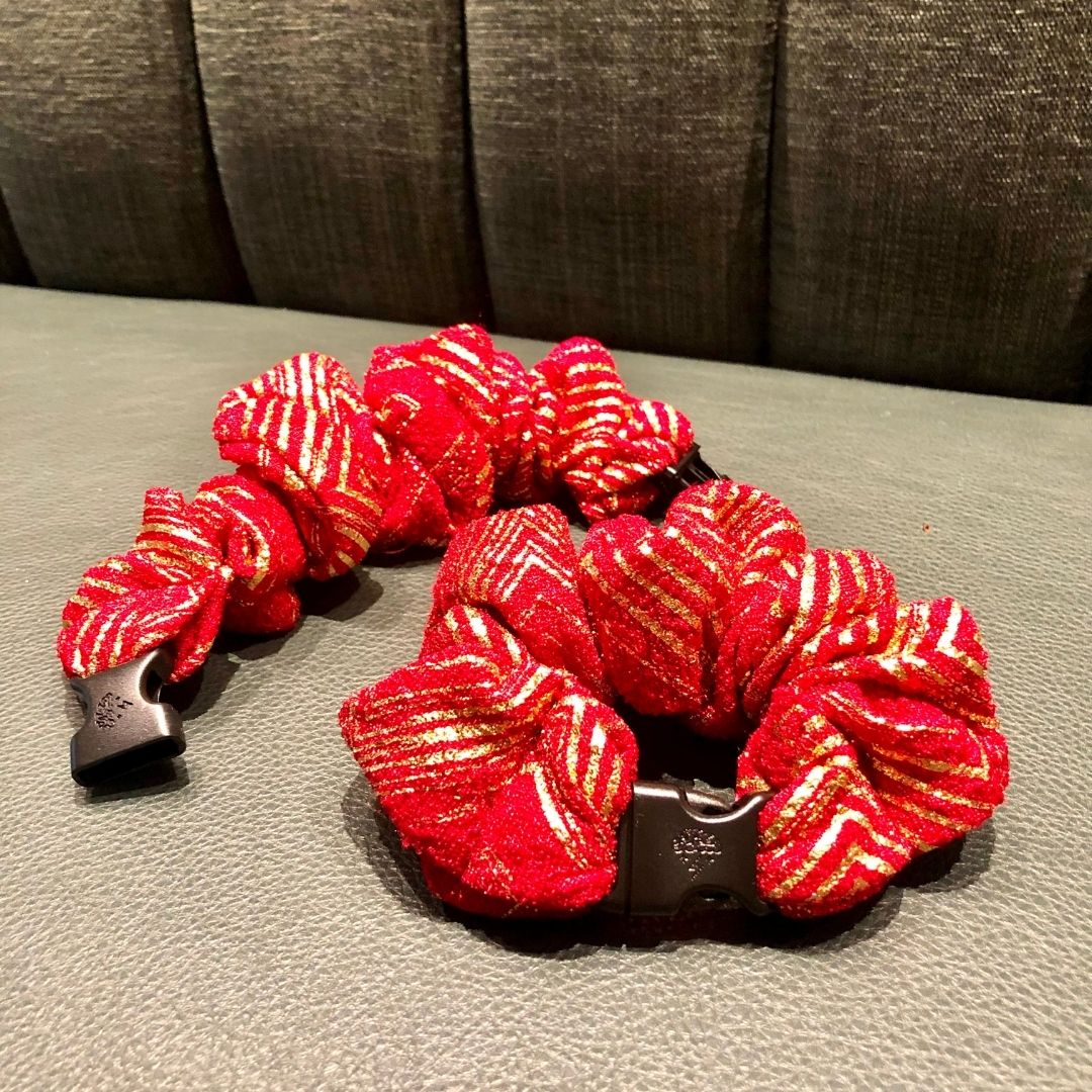 Best hair tie elastics and scrunchie hair accessories for snag-free, pull-free, rip-free, hair. Smooth, effortless hair ties and hair scrunchies for athletes, active moms, fitness, & sports. Merry & Bright Red Holiday Buckle Scrunchie - No Snagging, No Tangles
